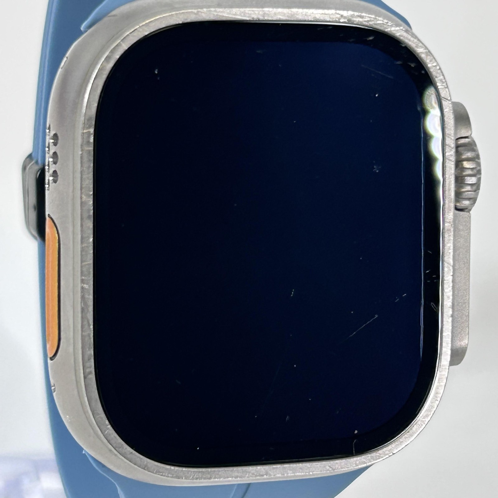 Apple Watch (Ultra) 49mm Titanium (LTE) w/ Non-OEM Blue Sport – Good Condition