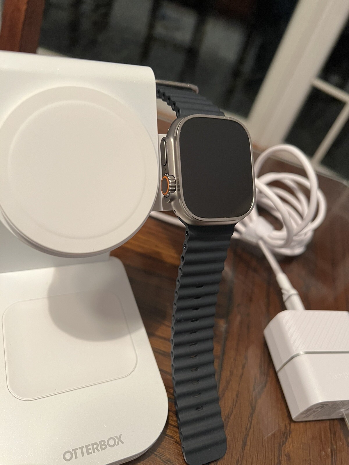 Apple Watch Ultra With 3-1 Otterbox Charging station.