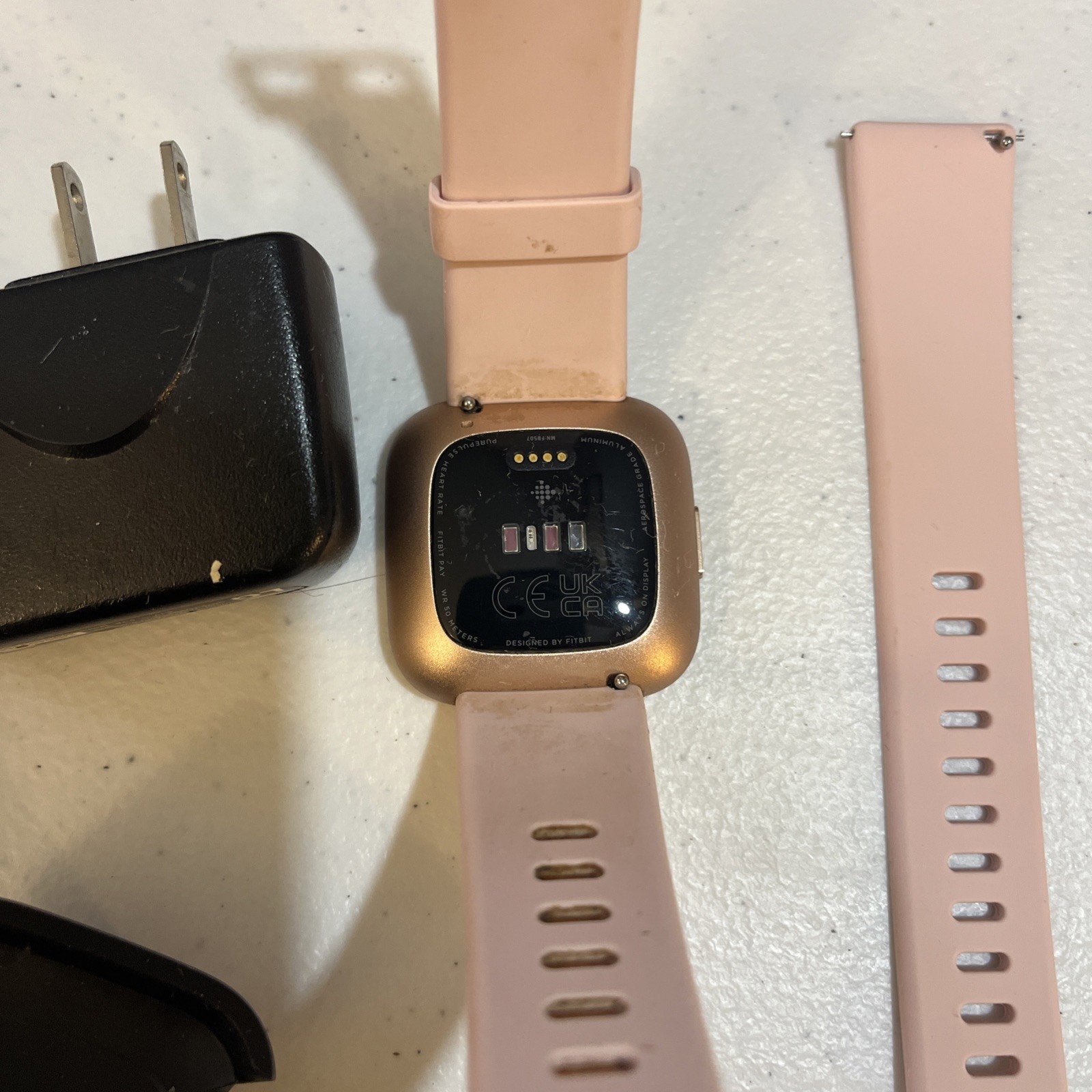 Fitbit Versa 2 – Health & Fitness Smart Watch Copper Rose / Pink Band FB507