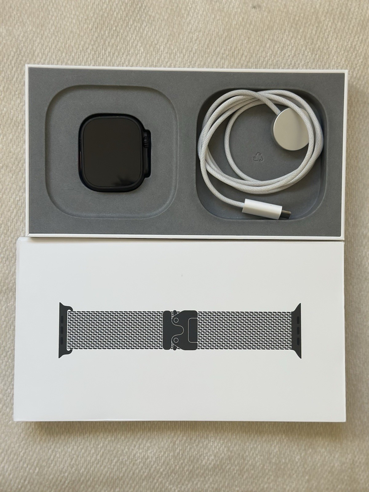 Apple Watch Ultra 3 49mm Black titanium with milanese loop black band