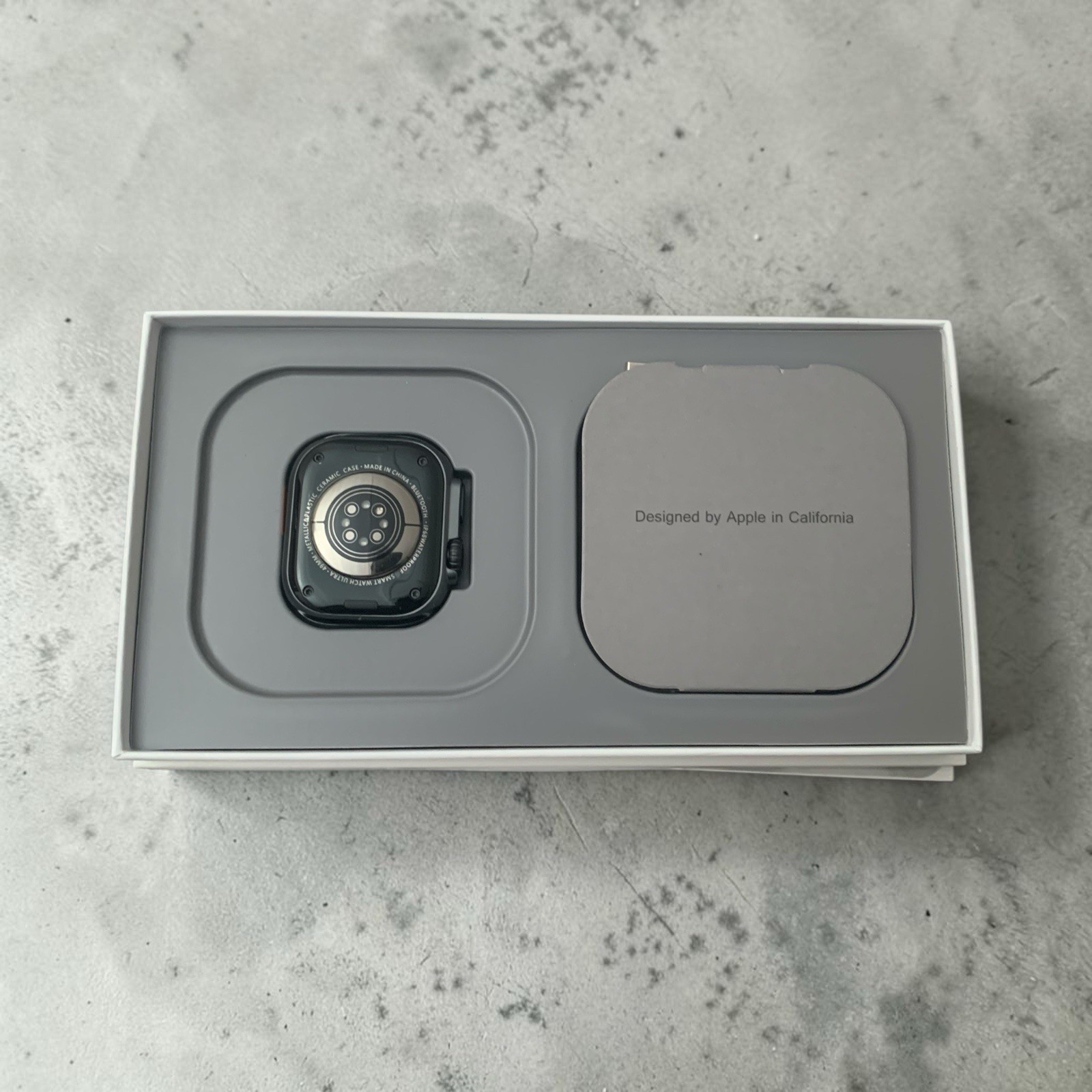 Apple Watch Ultra 49mm Black Titanium AMOLED, Black Fabric Band, 32GB Unlocked