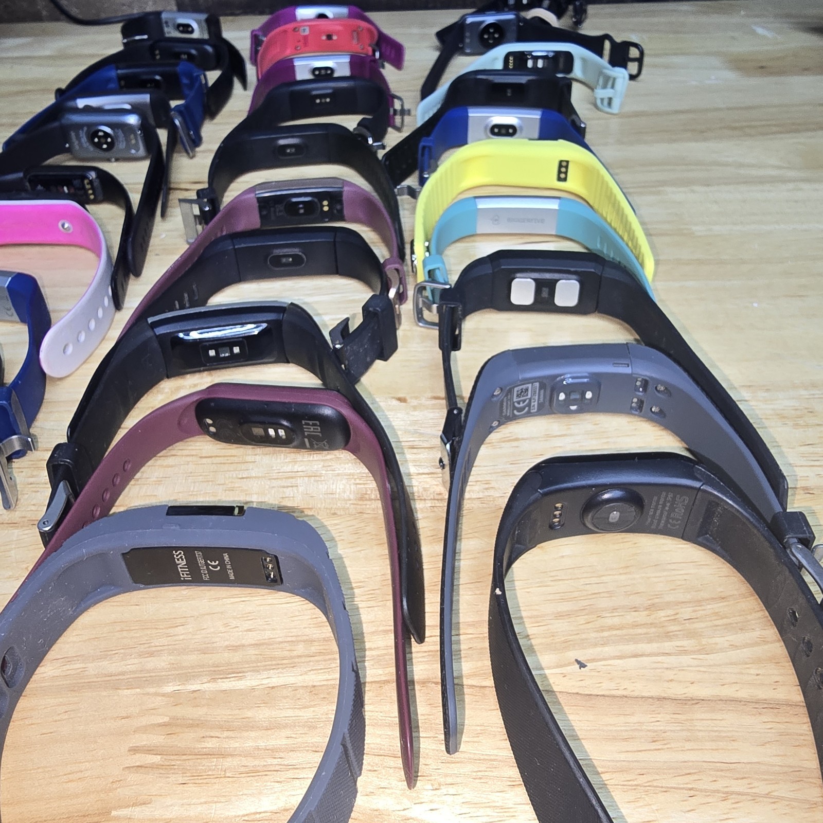 Lot of 30 Fitness Trackers Fitbit Garmin iFitness BiggerFive Vivosmart HR+