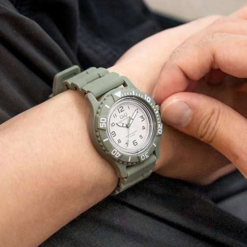 Citizen QQ Men’s Analog Solar Watch Water Resistant to 10 ATM Urethane Strap