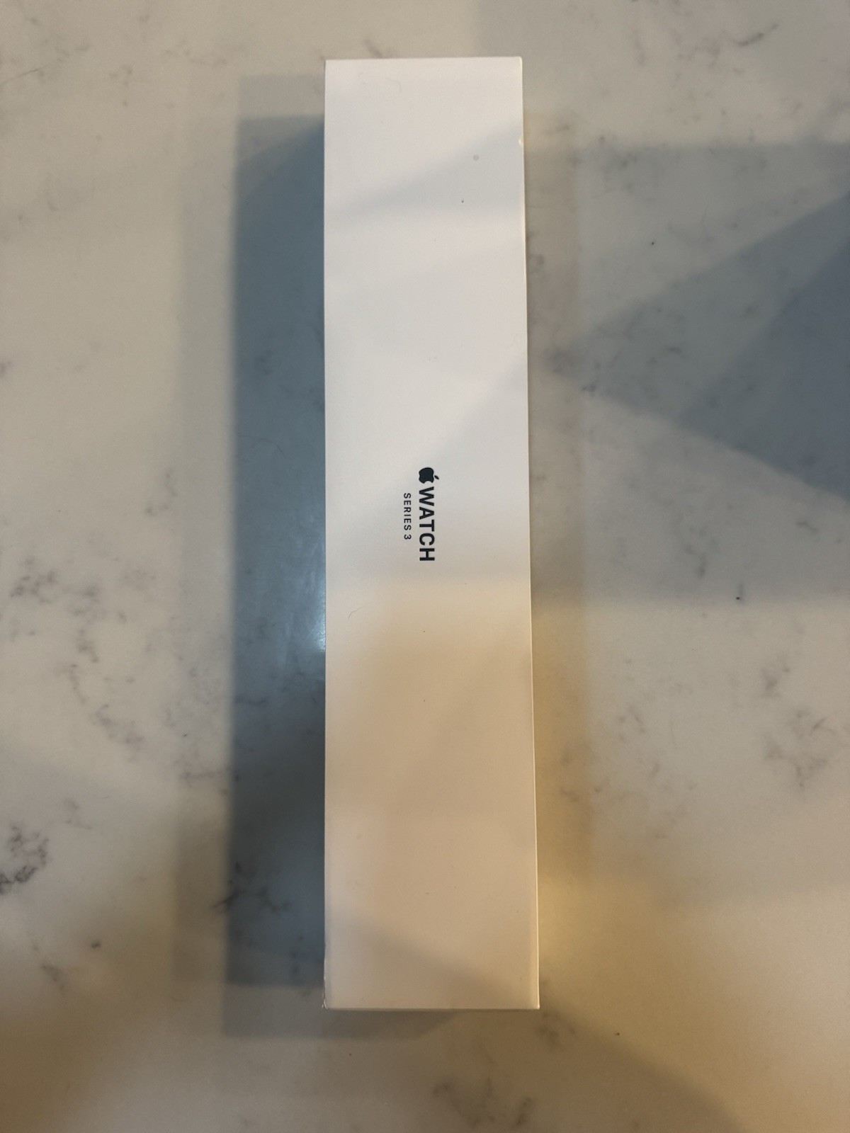Apple Watch Series 3, 38mm Silver Case and White Silicone Band