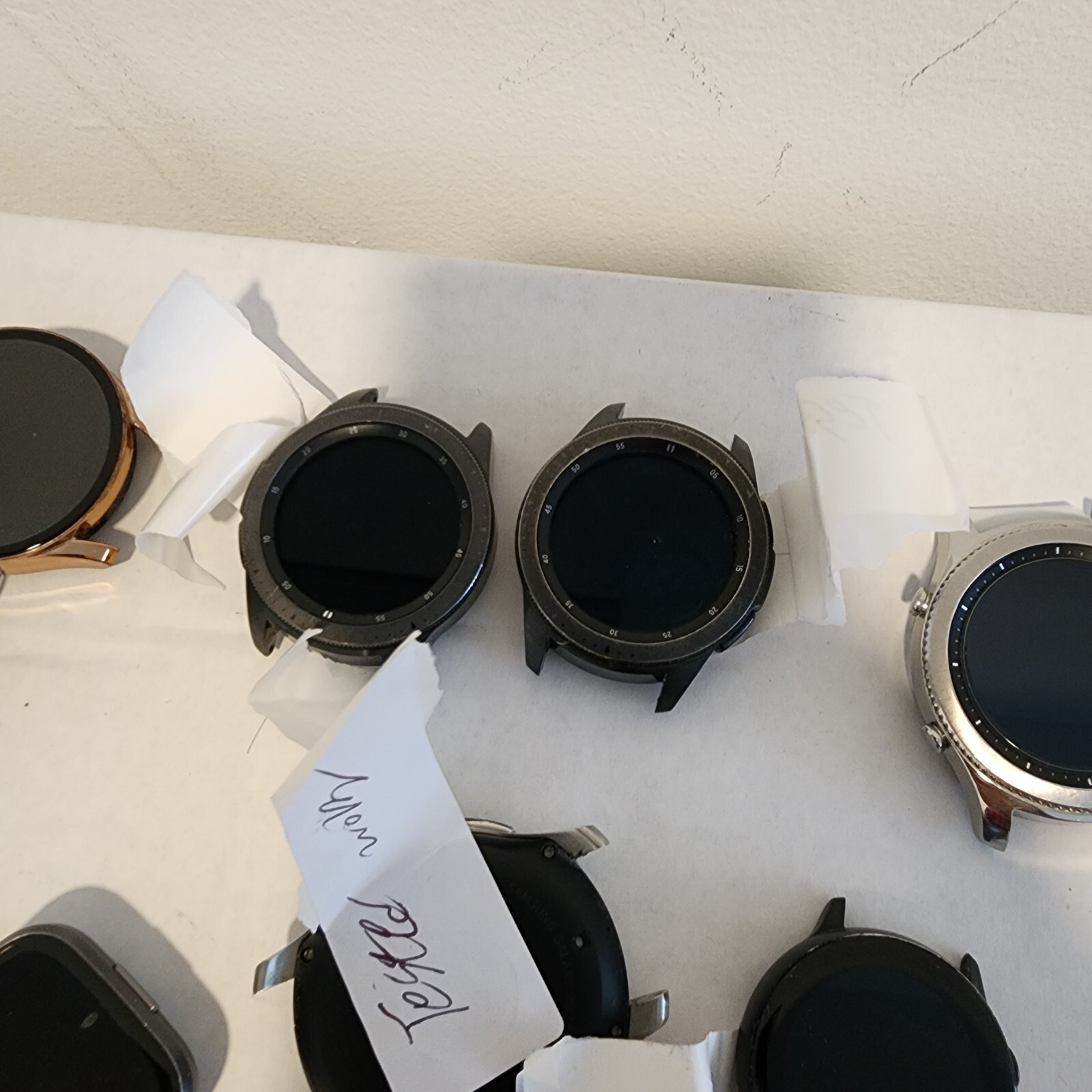 Lot of 14 Samsung Smartwatches – 90% Functional – No Bands or Chargers Included