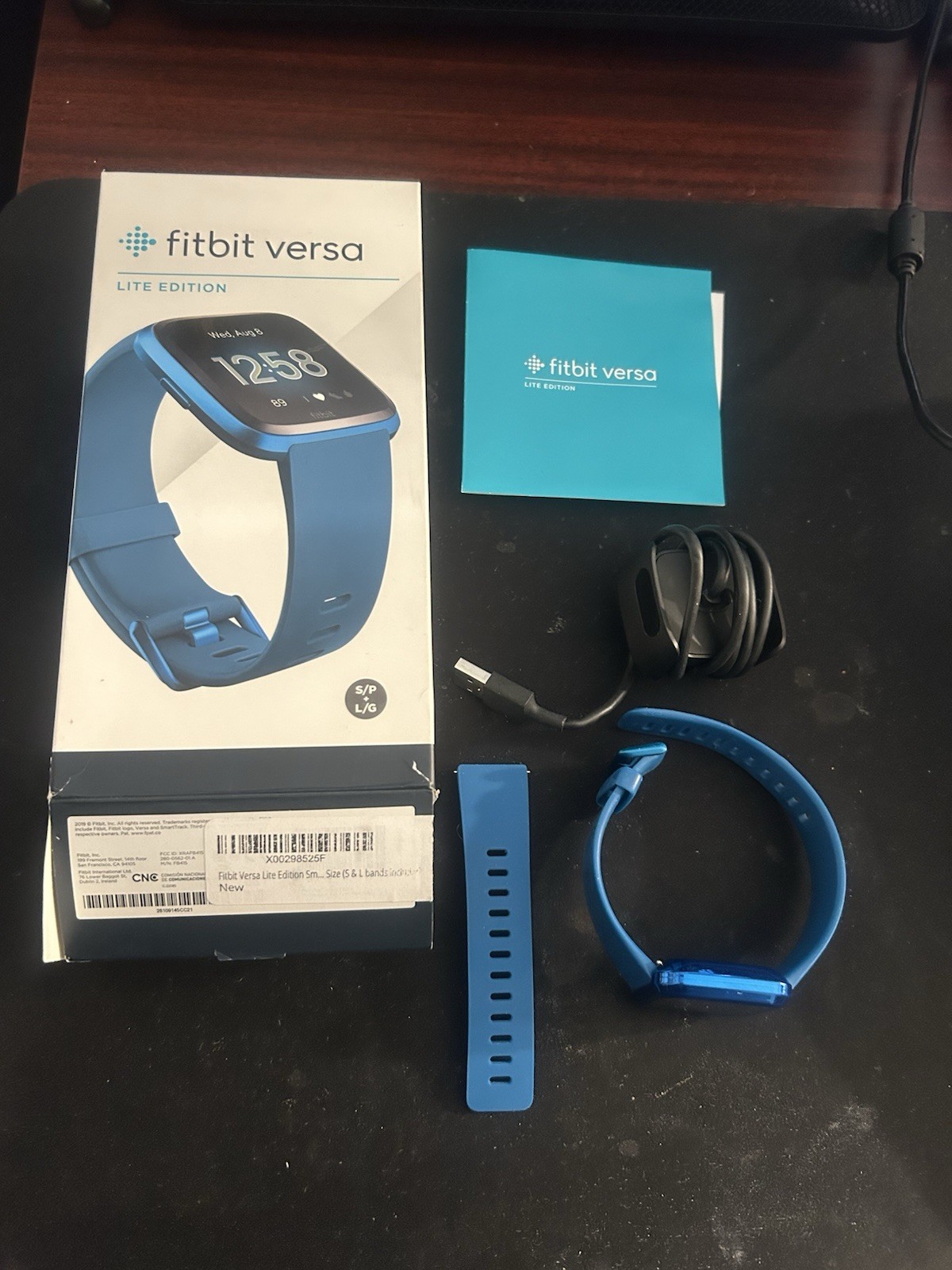 Fitbit Versa Lite Smart Watch (S & L bands included) – Marina Blue – Used
