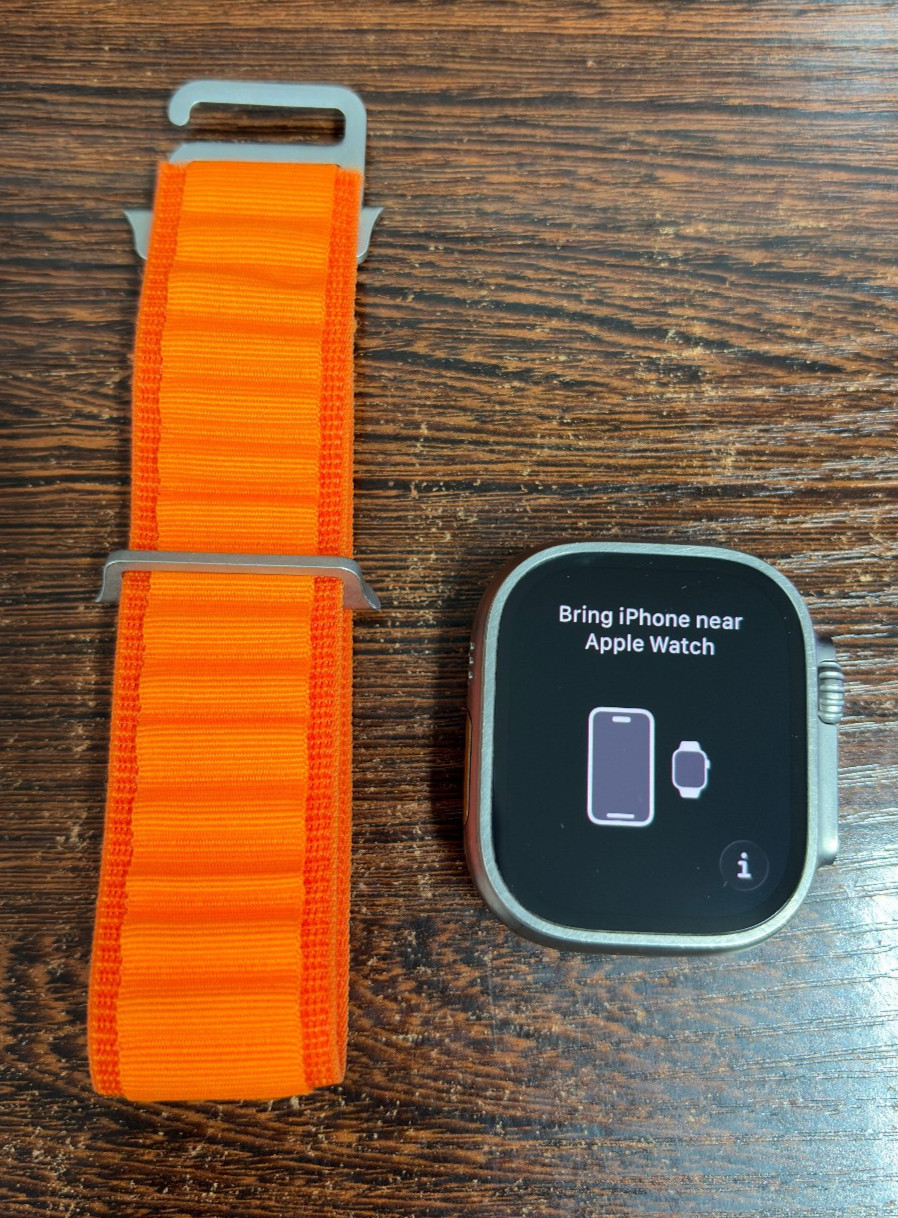 Apple Watch Ultra 49mm Titanium Case with Orange Alpine Loop – Great Condition