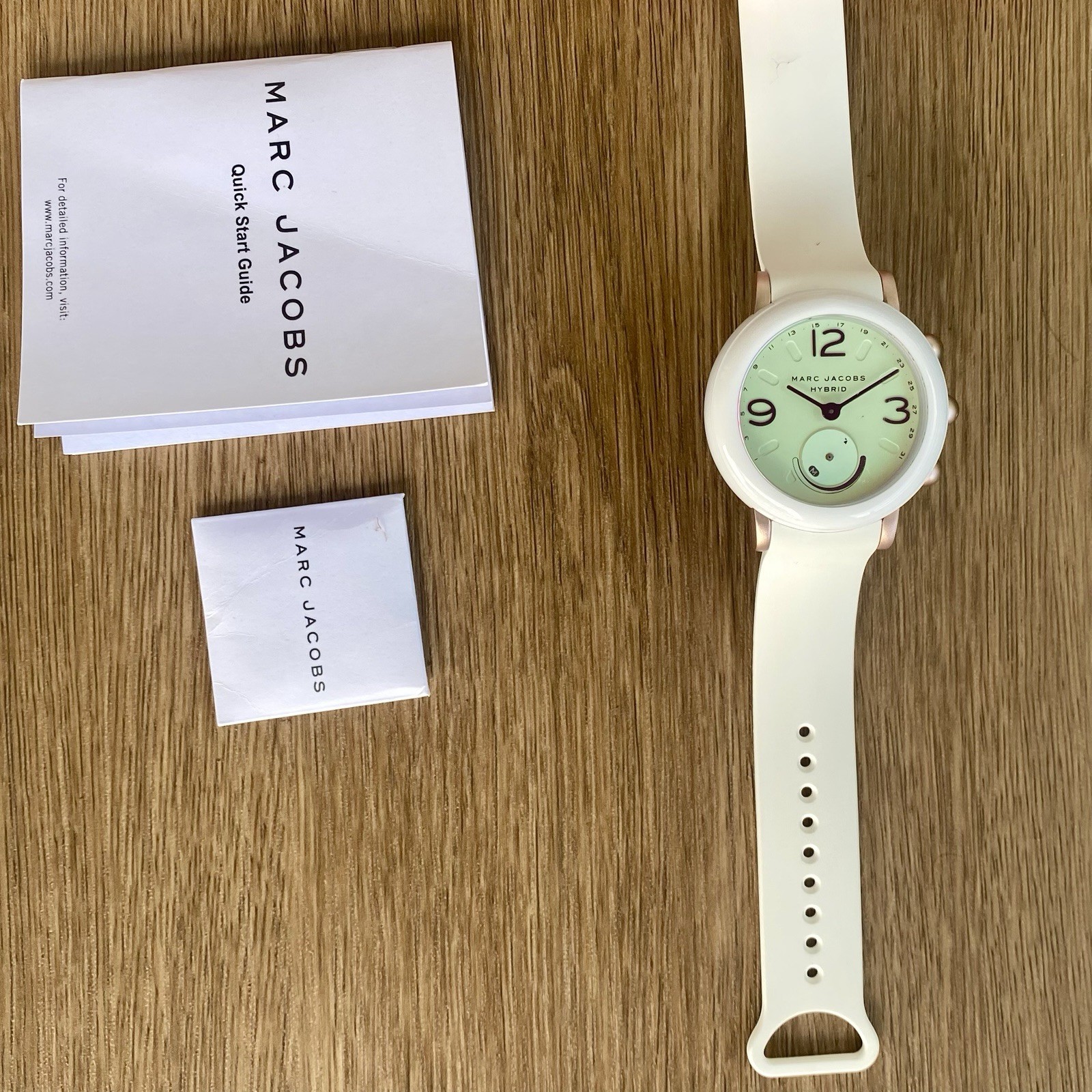 Marc Jacobs Riley NDW2T Women White Analog Dial Hybrid Smartwatch AEA044