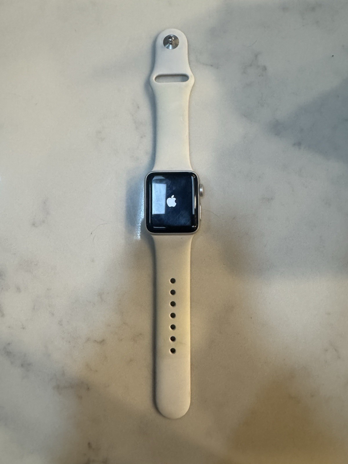 Apple Watch Series 3, 38mm Silver Case and White Silicone Band