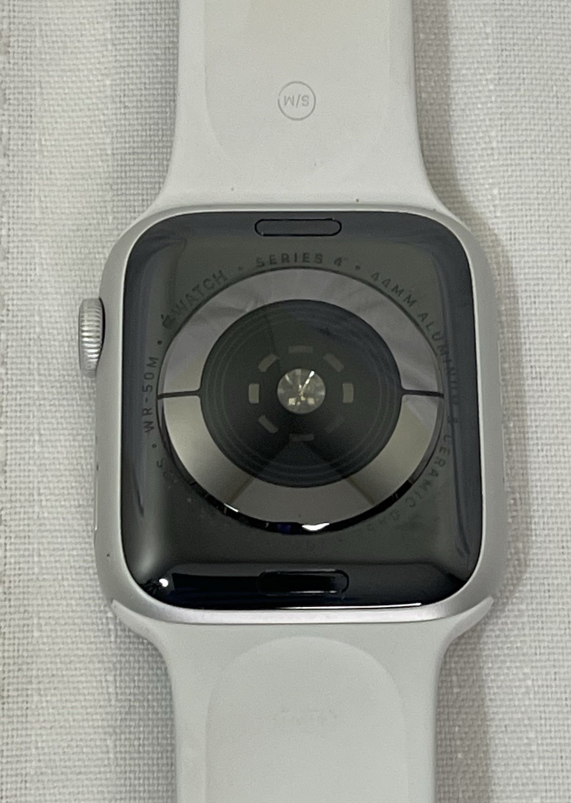 Apple Watch Series 4 44 mm Silver Aluminum & Ceramic Case with White Sport Band