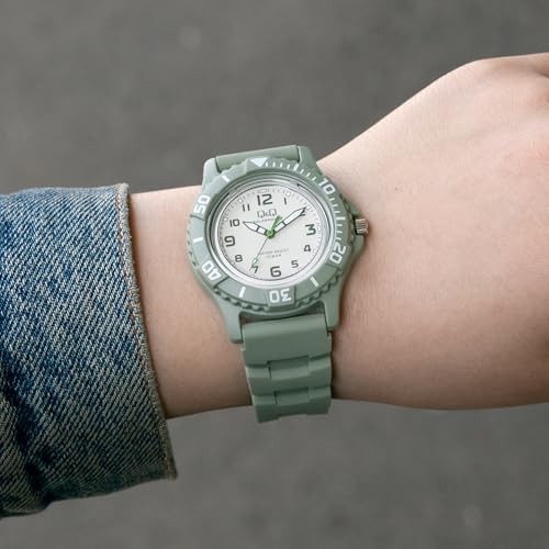 Citizen QQ Men’s Analog Solar Watch Water Resistant to 10 ATM Urethane Strap