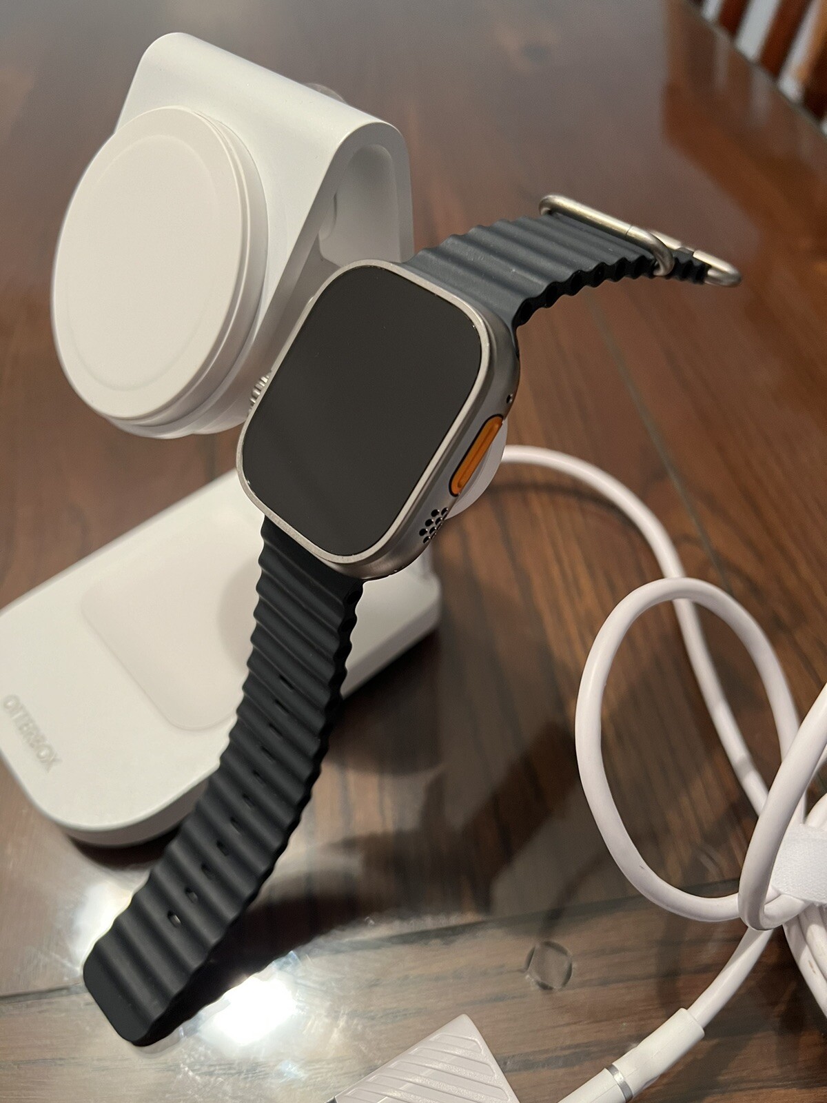 Apple Watch Ultra With 3-1 Otterbox Charging station.