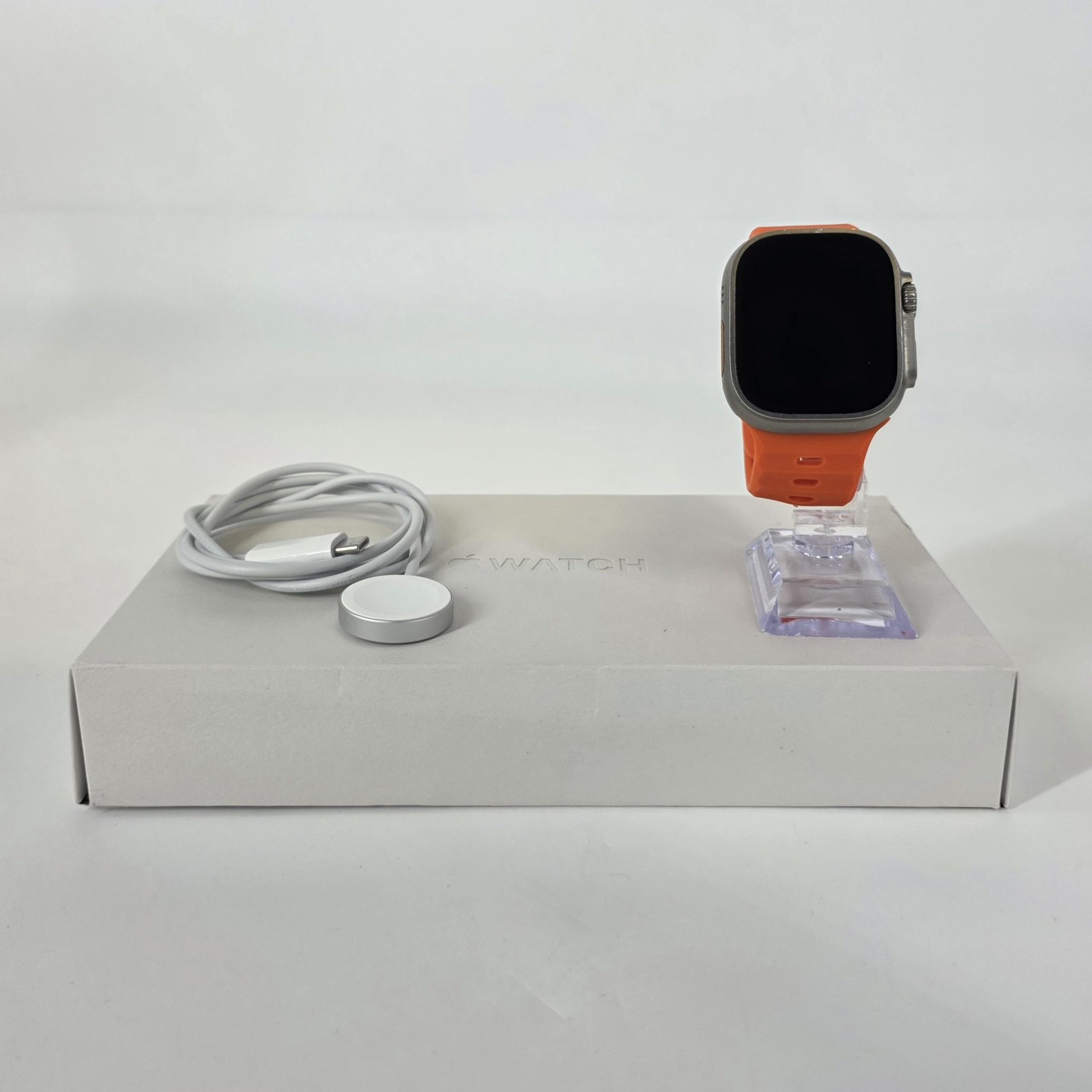 Apple Watch (Ultra) 49mm Titanium (LTE) w/ Orange Ocean Band – Excellent