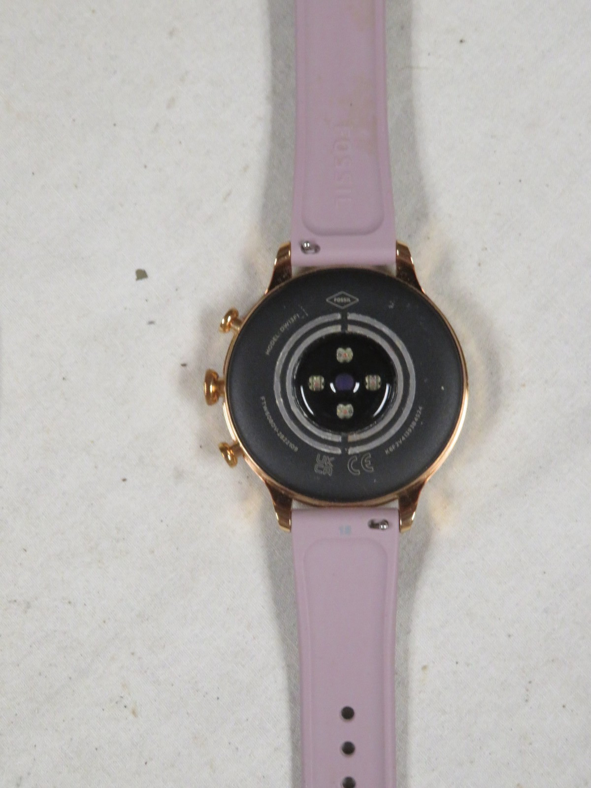 Fossil Women’s Gen 6 42mm Smartwatch Gold Face, Purple Silicone Band (FTW6080V)